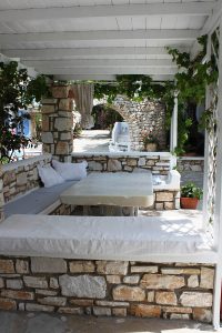 BBQ & outdoor lounge at the garden of Alpha Omega rooms in Drios Paros