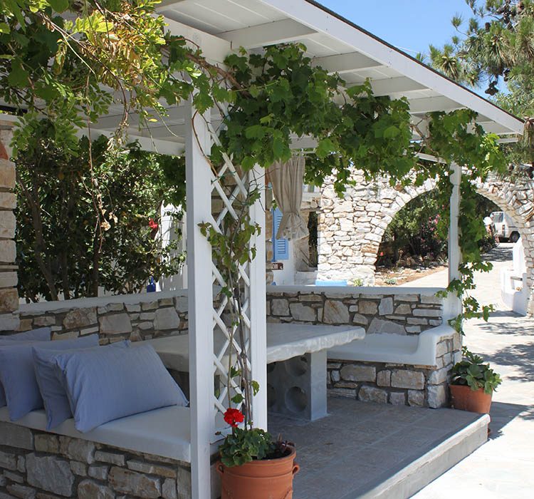 BBQ & outdoor lounge at the garden of Alpha Omega rooms in Drios Paros